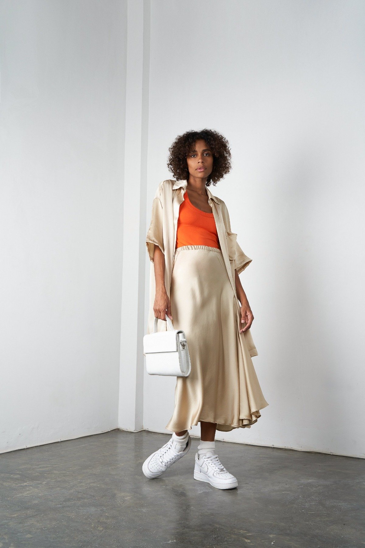 Arthur Asymmetric Ruffle Midi Skirt in Champagne